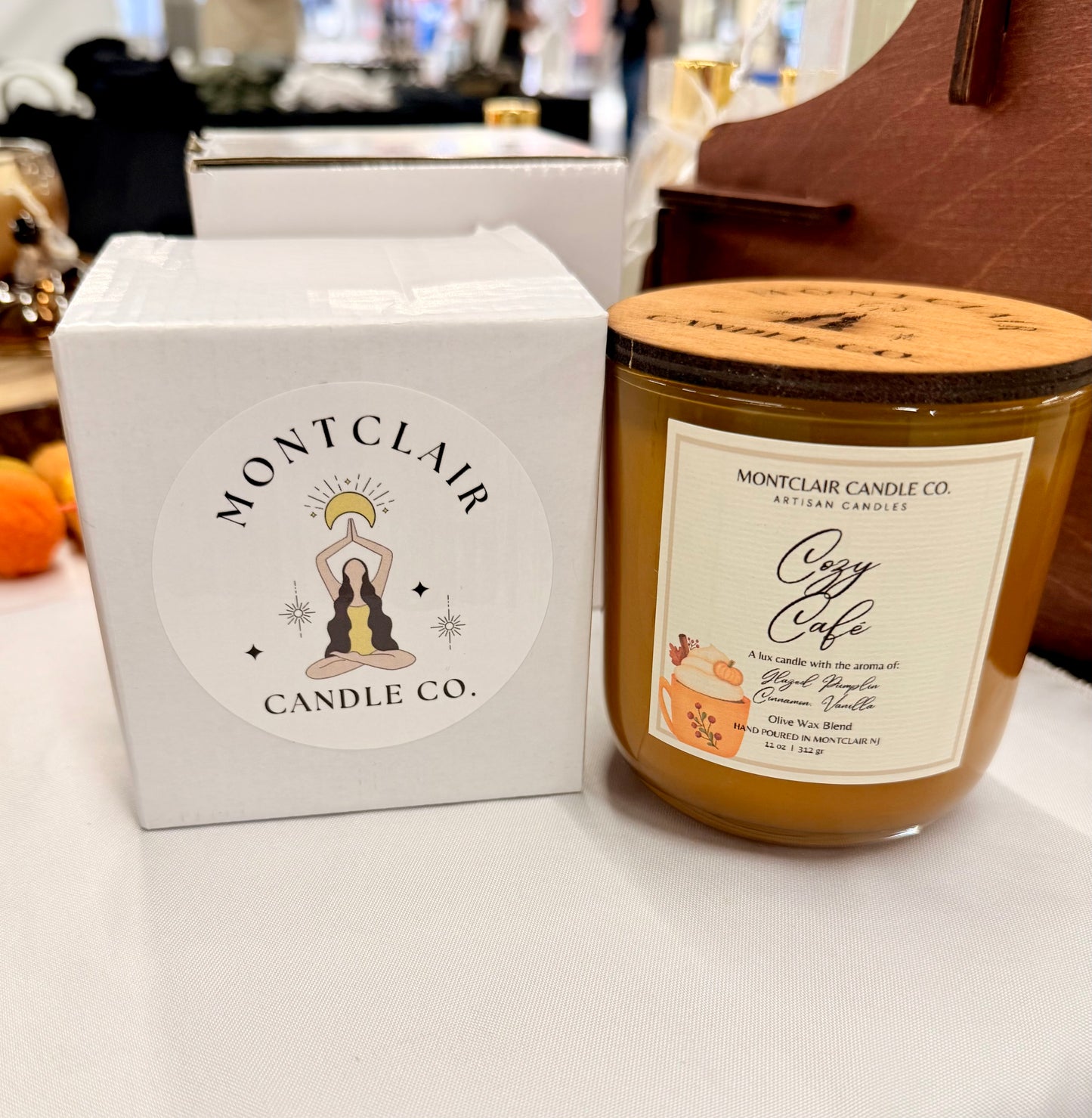 Montclair Candle Co. candle and packaging on a white surface